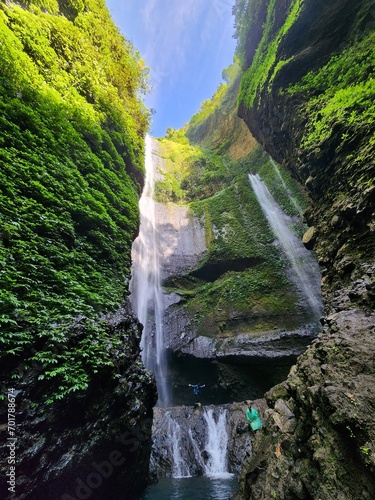 View of Madakaripura Waterfall in a green canyon located in East Java, Indonesia photo