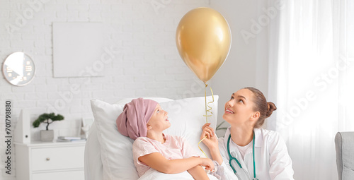 Doctor with golden balloon ...
