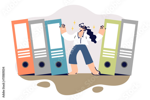 Business woman confidently pushes large folders, demonstrating skills in dealing with bureaucracy