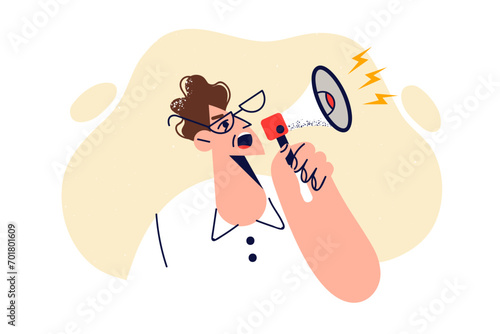 Nervous man shouts into megaphone, wanting to express protest against actions of society