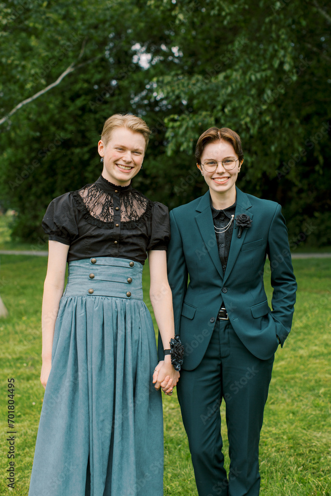 A portrait of a LGBT couple before heading to prom night. A portrait of a LGBT couple before heading to prom night.