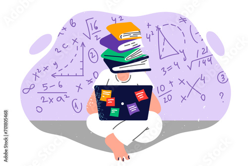 Student receives online education, sitting on floor with laptop on lap and books instead of head