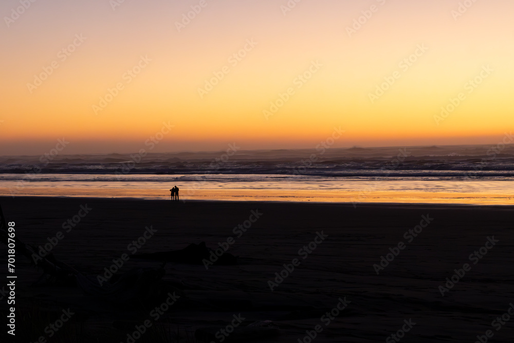People watching the sunset along the beach