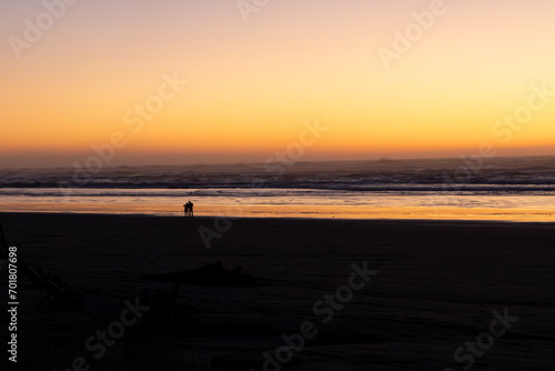People watching the sunset along the beach © CLShebley