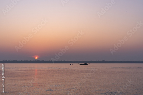 Beautiful sunset sky with island. Sunset at the beach.