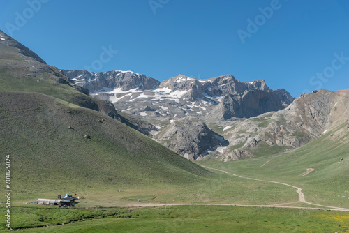 Bolkar mountains from various angles green colored nature flowing water lakes cloudy sky and steep sharp rock forms