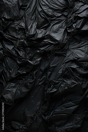 Background plastic background wrinkled material textured abstract crumpled black pattern blank