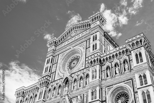 Decorations of the top facade of the Florence Cathedral, cathedral of Santa Maria del Fiore in Florence, Tuscany, Italy in black and white