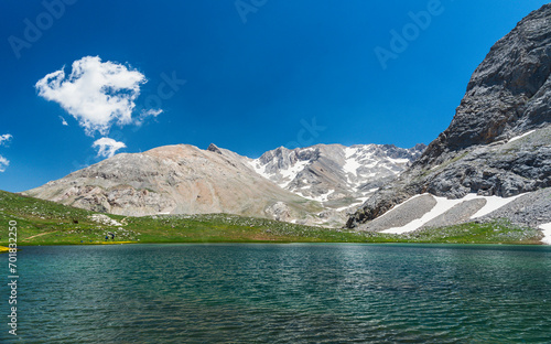 Bolkar mountains from various angles green colored nature flowing water lakes cloudy sky and steep sharp rock forms