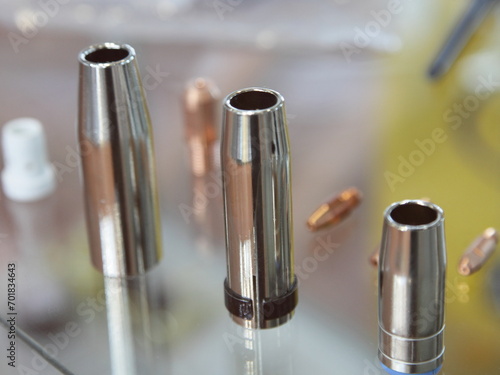 Obraz na płótnie Replaceable nozzles for MIG MAG welding torch w salonie