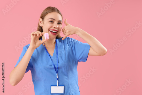 Female dentist with plastic...