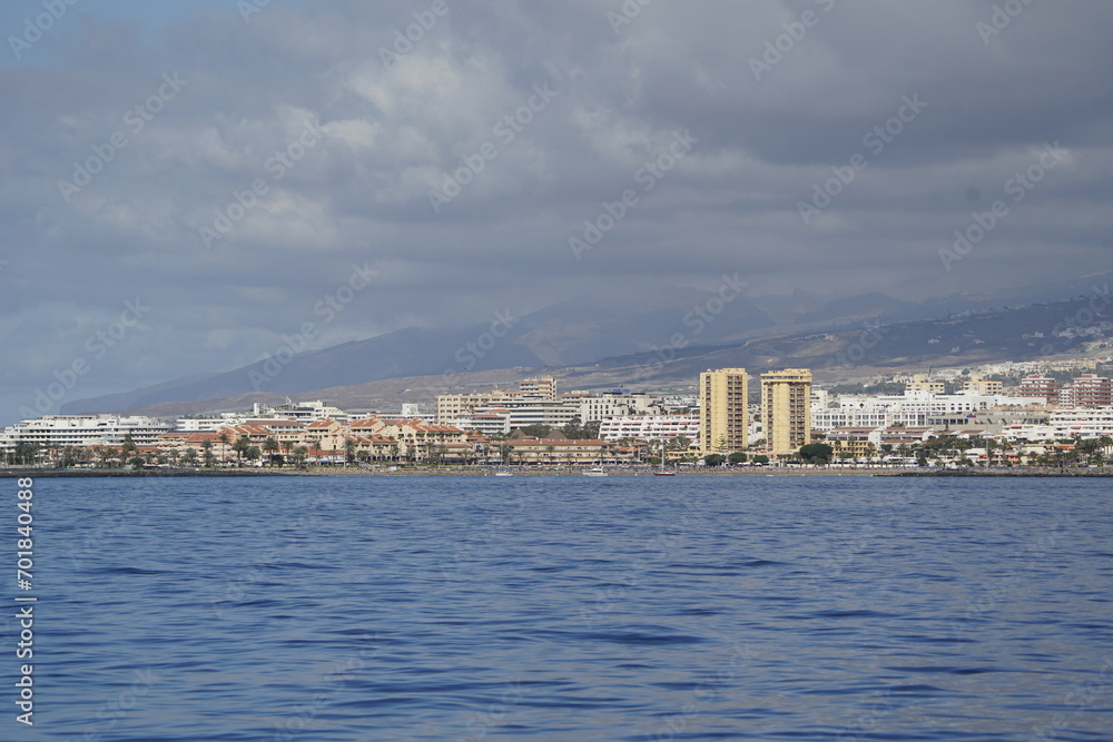 View of Puerto de Los Cristianos, seen from the boat. Tenerife island, Spain.