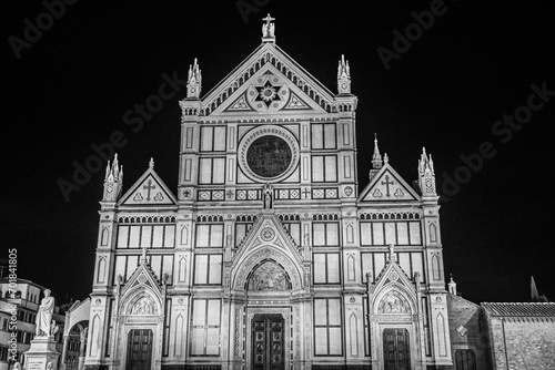 Night view of the facade of the Basilica of Santa Croce in Piazza di Santa Croce in Florence, Tuscany, Italy, known also as the Temple of the Italian Glories in black and white photo