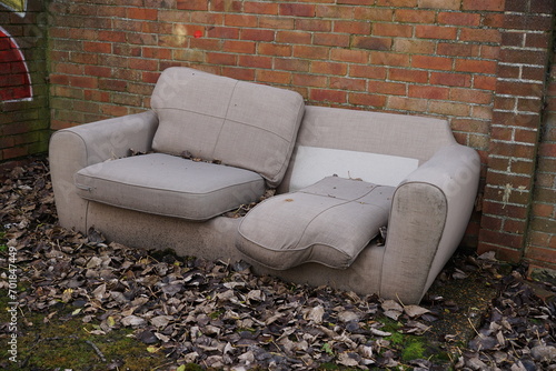 Obraz na plátne old sofa thrown out on street