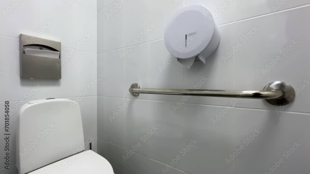 Public inclusive toilet in a clinic or hospital for people with disabilities. Low angle view Public inclusive toilet in a clinic or hospital for people with disabilities. Low angle view