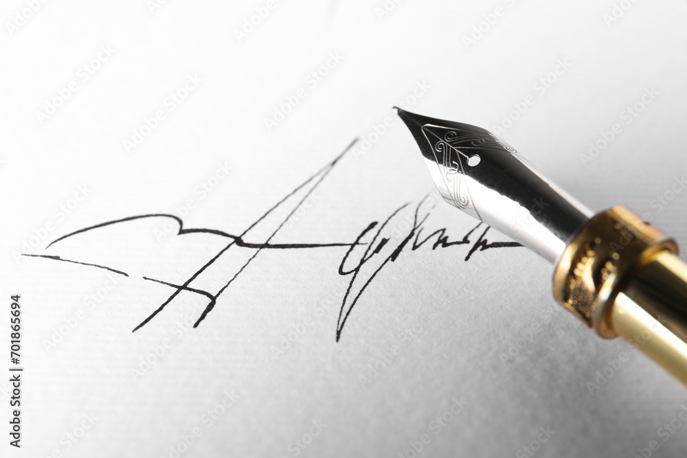Sheet of paper with fountain pen and signature, closeup - obrazy, fototapety, plakaty 