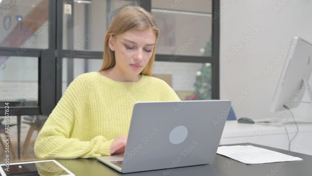 Young Blonde Woman Working on Laptop Young Blonde Woman Working on Laptop