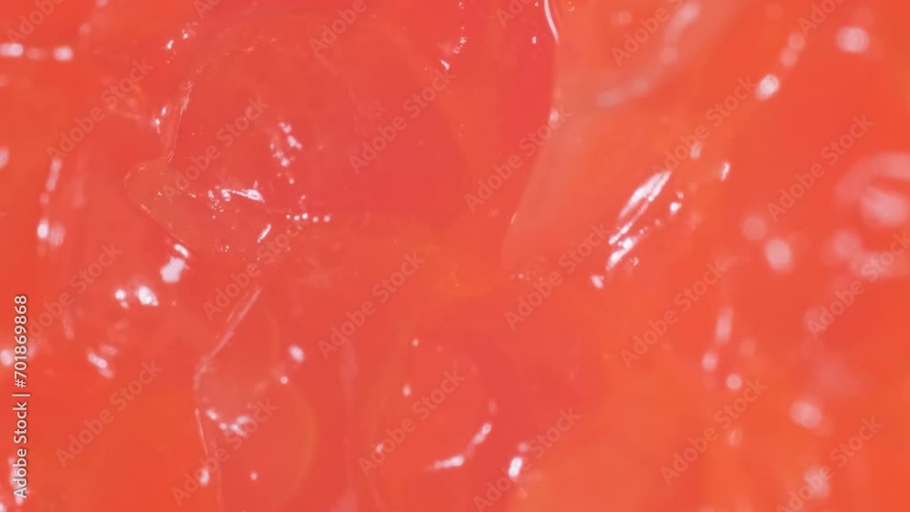 Macro video of fresh red caviar spinning in a circle. Caviar background. Fish delicacy. Vertical video Macro video of fresh red caviar spinning in a circle. Caviar background. Fish delicacy. Vertical video