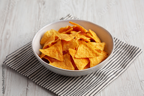 Homemade Cheese Tortilla Chips in a Bowl, side view.