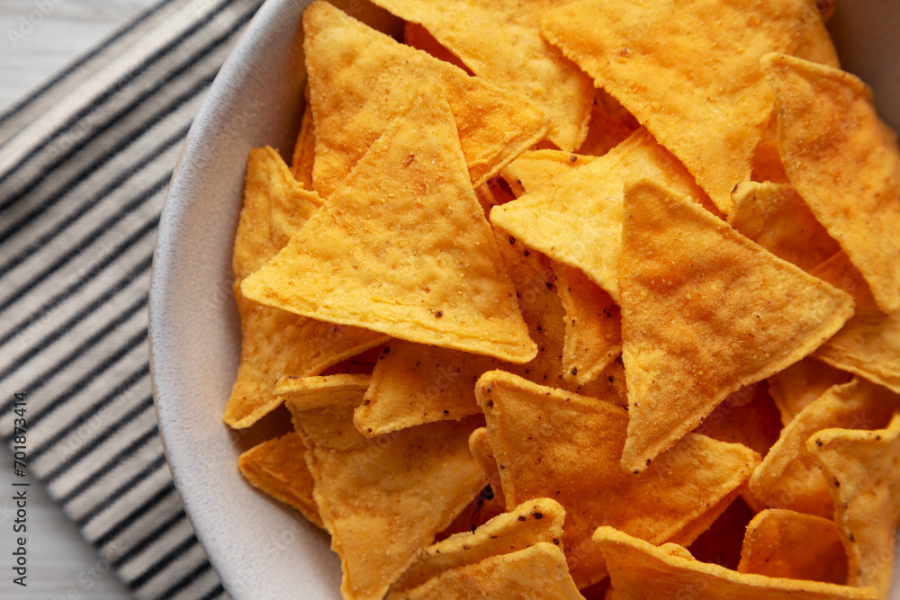 Homemade Cheese Tortilla Chips in a Bowl, top view. Flat lay, overhead, from above. Close-up.