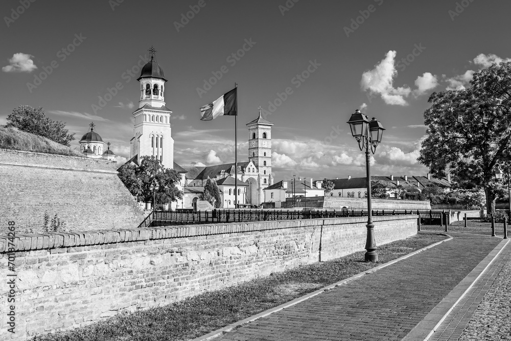 Fototapeta premium The coronation orthodox cathedral and the catholoc cathedral inside Alba Carolina citadel in Alba Iulia, Transylvania, Romania in black and white