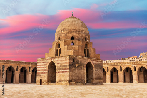 Ablution fountain in Ibn Tulun Mosque, popular place of visit of Cairo, wonderful sunset view, Egypt photo
