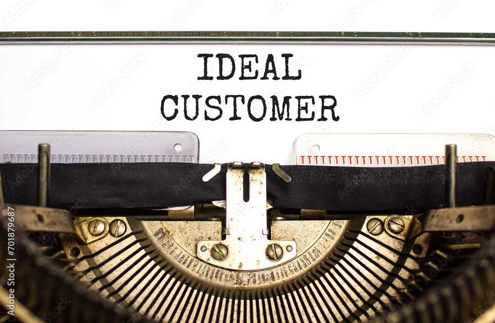 Ideal customer symbol. Concept words Ideal customer typed on beautiful old retro typewriter. Beautiful white paper background. Business ideal customer concept. Copy space.