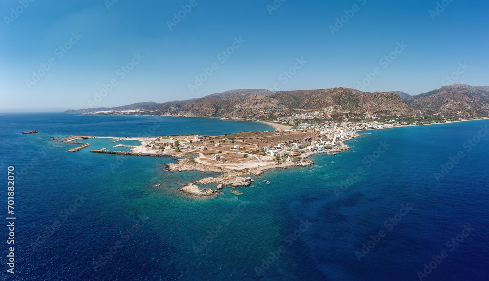 Greece, Crete island, Palaiochora town. Aerial drone panoramic view of sea water, seaside building.