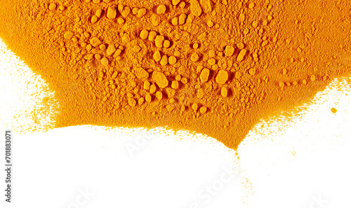 Turmeric (Curcuma) powder pile isolated on white background, top view photo