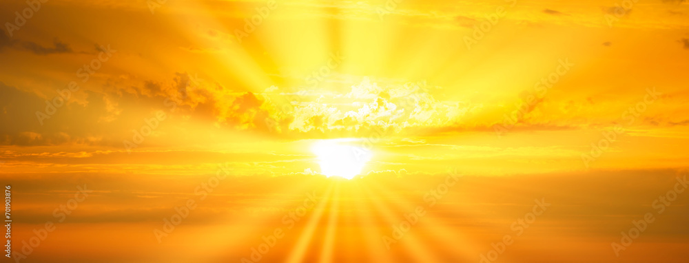 Obraz premium Sunset sky panorama with sunset clouds, sun rays and dramatic sky