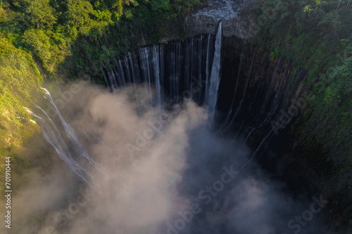 Fototapeta Naklejka Na Ścianę i Meble -  Aerial view of Tumpak Sewu waterfall during a morning in East Java, Indonesia