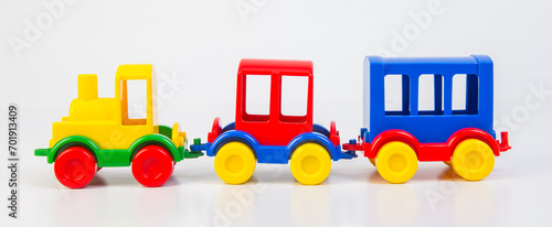 Plastic toy steam locomotive with carriages