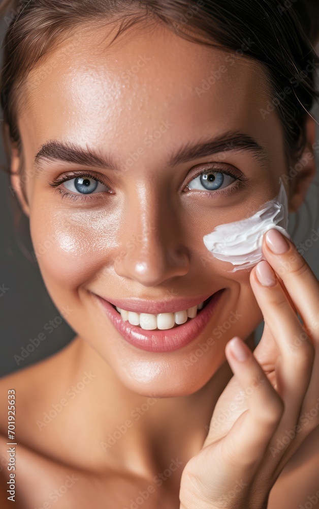 Skincare. Beauty Concept. Young pretty woman applying sun cream and touch own face. Female in hat smear sunscreen lotion on skin. Skin Protection and dermatology. Skincare. Beauty Concept. Young pretty woman applying sun cream and touch own face. Female in hat smear sunscreen lotion on skin. Skin Protection and dermatology.