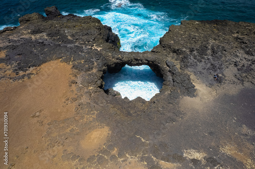 Aerial HDR view of 'Pont Naturel' which is a natural bridge formed by lava many years ago on the south coast of Mauritius island.