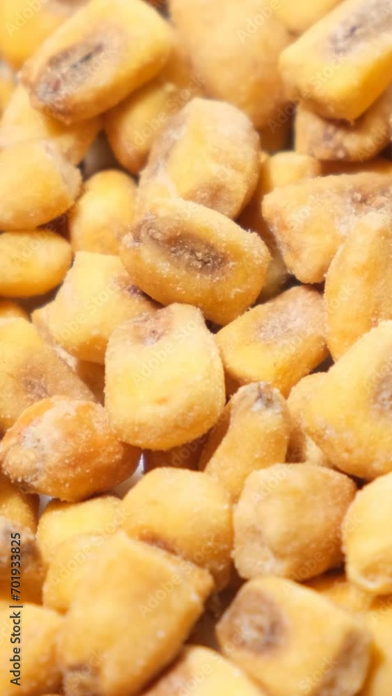 Dried corn rotates in a circle. Corn background. Vertical video Dried corn rotates in a circle. Corn background. Vertical video
