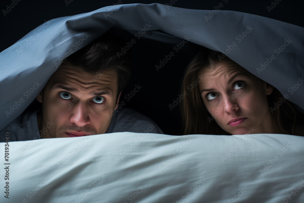 Couple in bed, confrontation and misunderstanding.