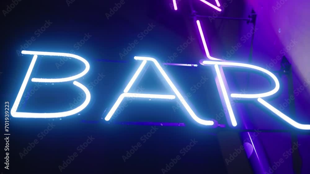 Blue neon BAR sign at night Blue neon BAR sign at night