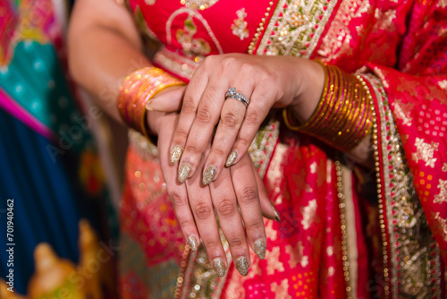 Indian bride's hands bangles and mehndi close up