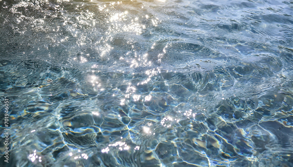 background of the blue sea water surface with sun rays and lens flare - obrazy, fototapety, plakaty 