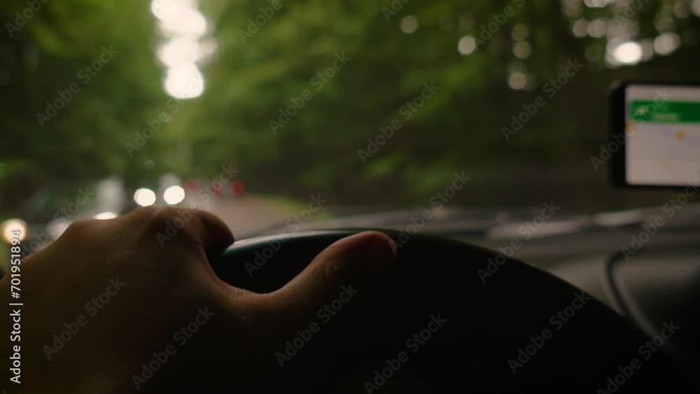 Man hands on steering wheel male driving car Close up. Traveling by highway in countryside in SUV, cloudy rainy summer day Man hands on steering wheel male driving car Close up. Traveling by highway in countryside in SUV, cloudy rainy summer day