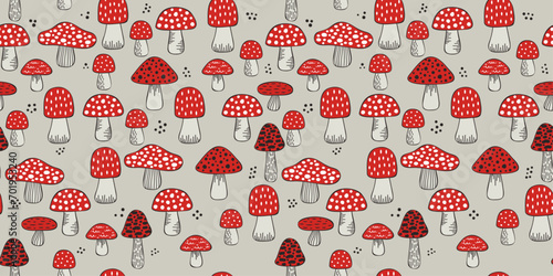 Red poisonous fly agarics. Drawn pattern with fly agarics. For print and seamless surfaces.