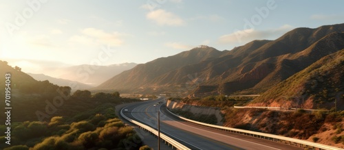 Beautiful views of the mountains from the winding highway, at sunrise and clear blue skies photo