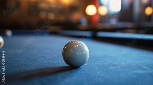Billiard ball on blue pool table