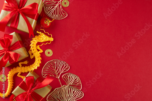 Honoring customs with thoughtful Chinese New Year gifts. Top view flat lay of gold dragon  gift boxes  ginkgo biloba  lucky coins  lanterns on red background with ad panel