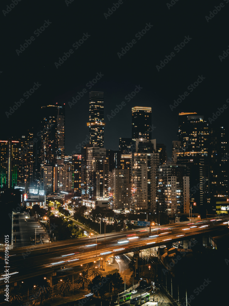 Fototapeta premium Melbourne Skyline Sparkles in the Night, Victoria, Australia. Big City at Night. Buildings. Skyscrapers