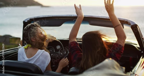 Nature, travel and girl friends on road trip for holiday, vacation or weekend together. Adventure, freedom and young women driving a car in wind for transportation, tourism or sightseeing by coast. photo