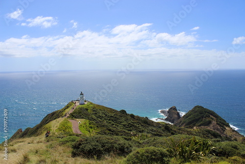 new zealand sea beach and rocks blue sky northern island lieghthouse  © LetsSeeGoodWaves