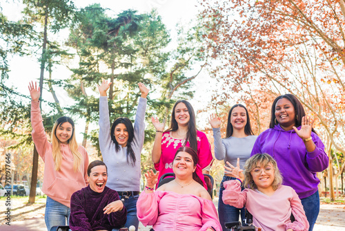 Greeting gesture, multiethnic group with disability cerebral palsy person. International womens day