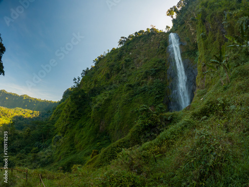 View of Citambur Waterfall during a morning in West Java, Indonesia photo