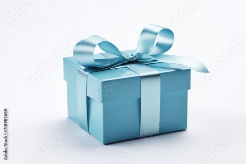 White background with blue ribbon tied around gift box © The Big L